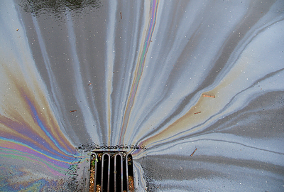 oil draining into storm drain
